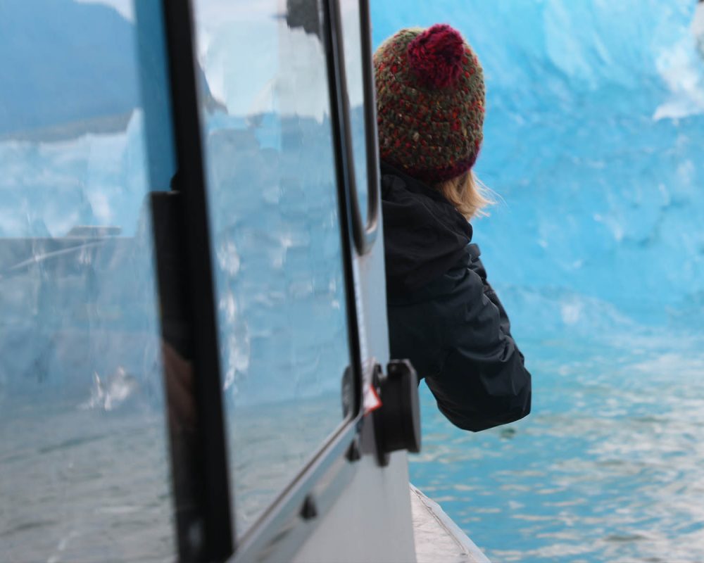 Photographing blue ice in LeConte Bay fjord during glacier photo tour by FauneVoyage Tours in Petersburg, Alaska